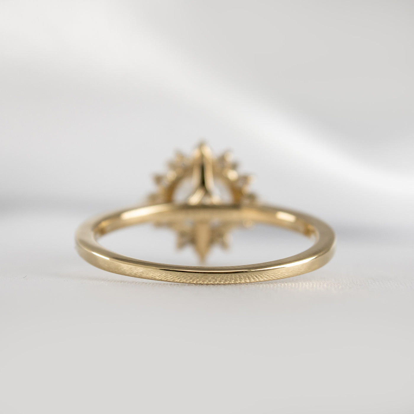 Shown in 1.5 carat Moissanite* The Jaylin Halo Moissanite and Diamond Engagement Ring | Lisa Robin#color_14k-yellow-gold