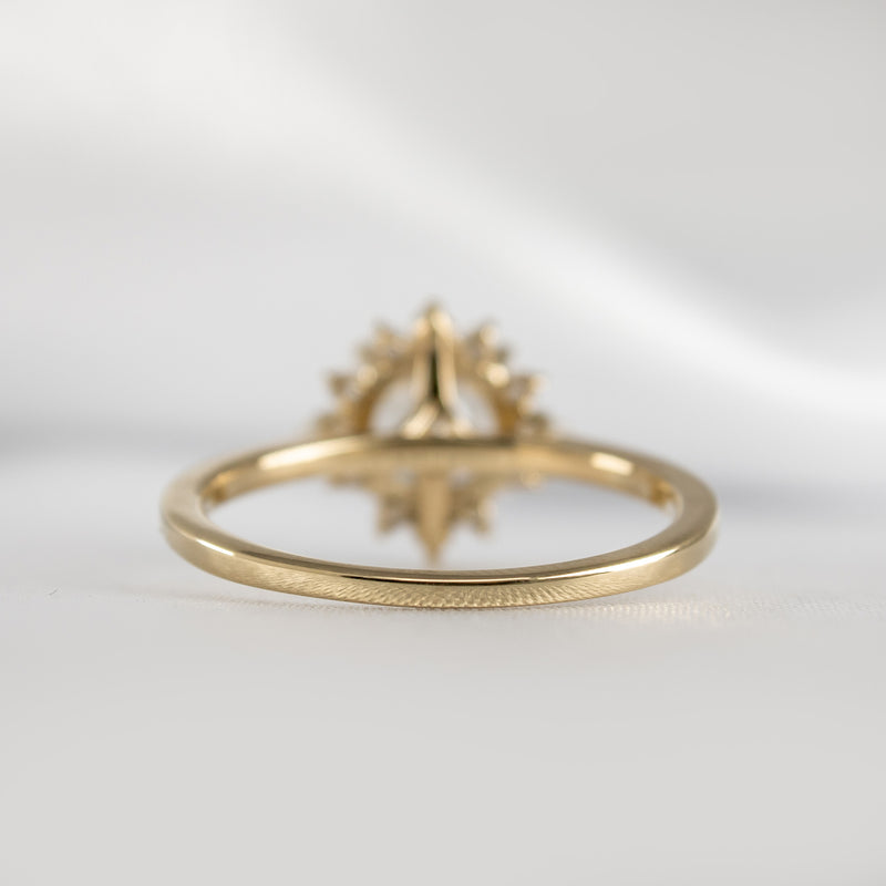 Shown in 1.5 carat Moissanite* The Jaylin Halo Moissanite and Diamond Engagement Ring | Lisa Robin