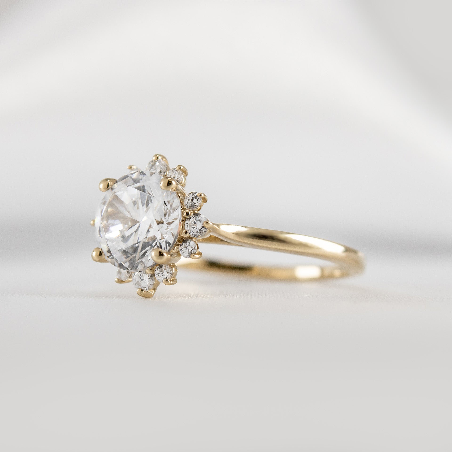 Shown in 1.5 carat Diamond*The Jaylin Round Diamond Halo Engagement Ring#color_14k-yellow-gold