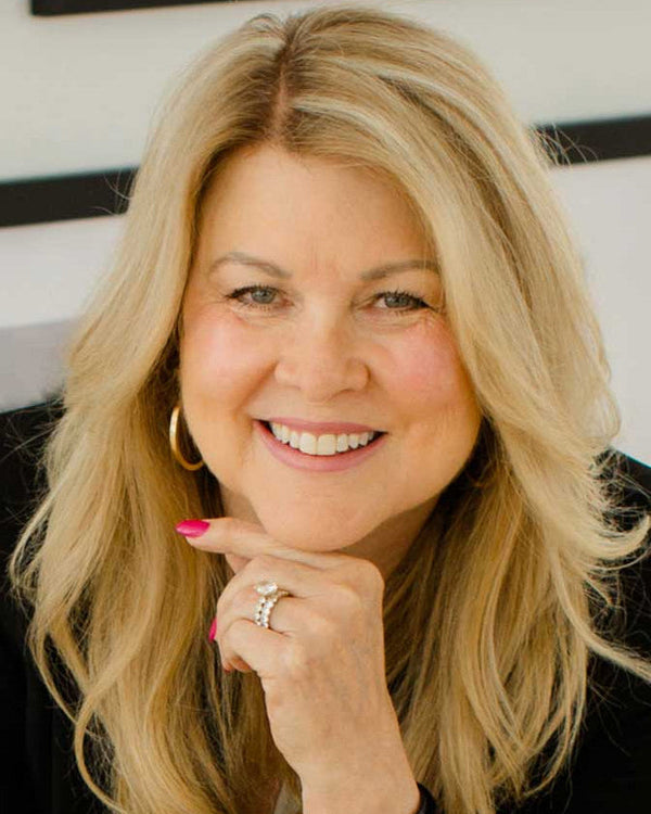 Lisa Robin Adkinson head shot portrait. Lisa is the jewelry designer and founder of Lisa Robin Jewelry.