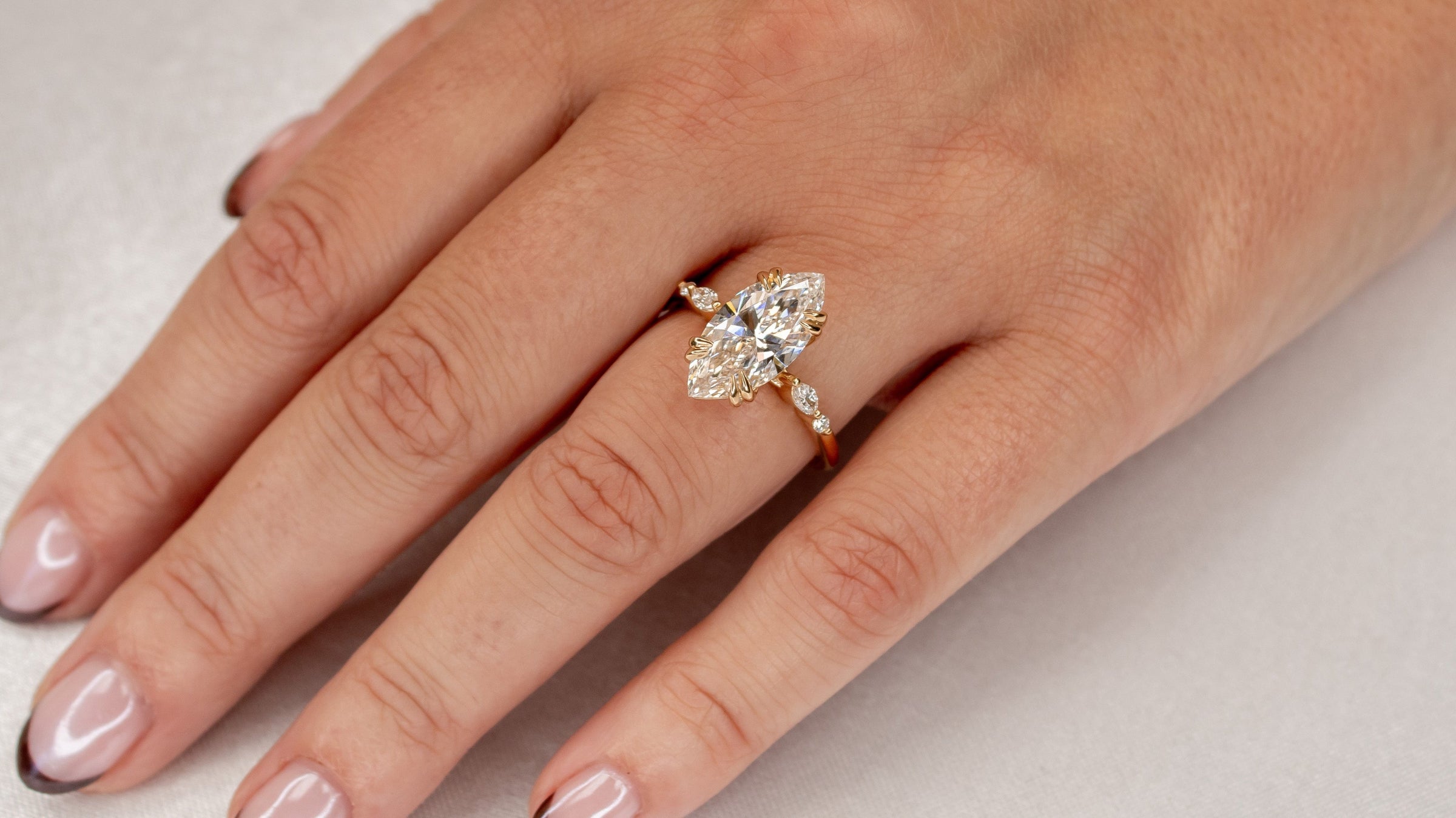 The Sage marquise diamond side stone engagement ring | Lisa Robin