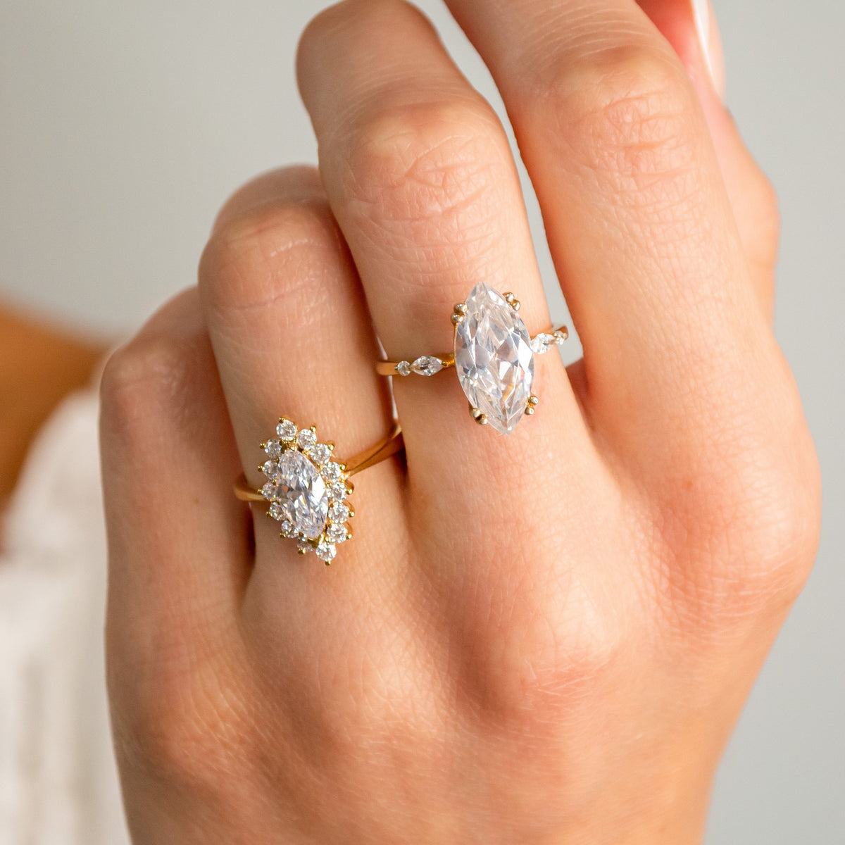 Marquise diamond engagement rings on model | Lisa Robin