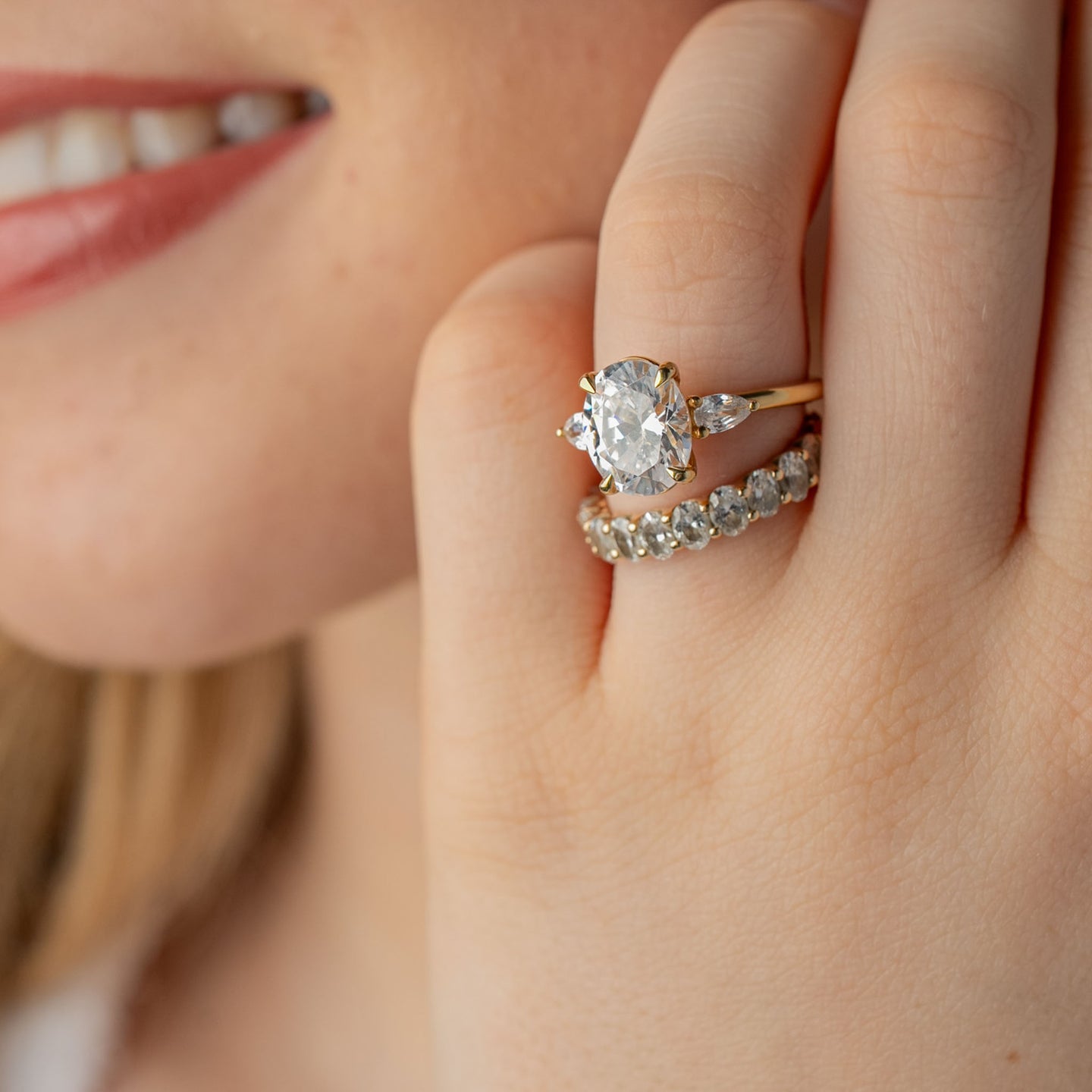 Engagement ring preferences lean clearly toward softer diamond shapes as shown iwth the Melayna 3 carat oval diamond three stone engagement ring by Lisa Robin jewelry.