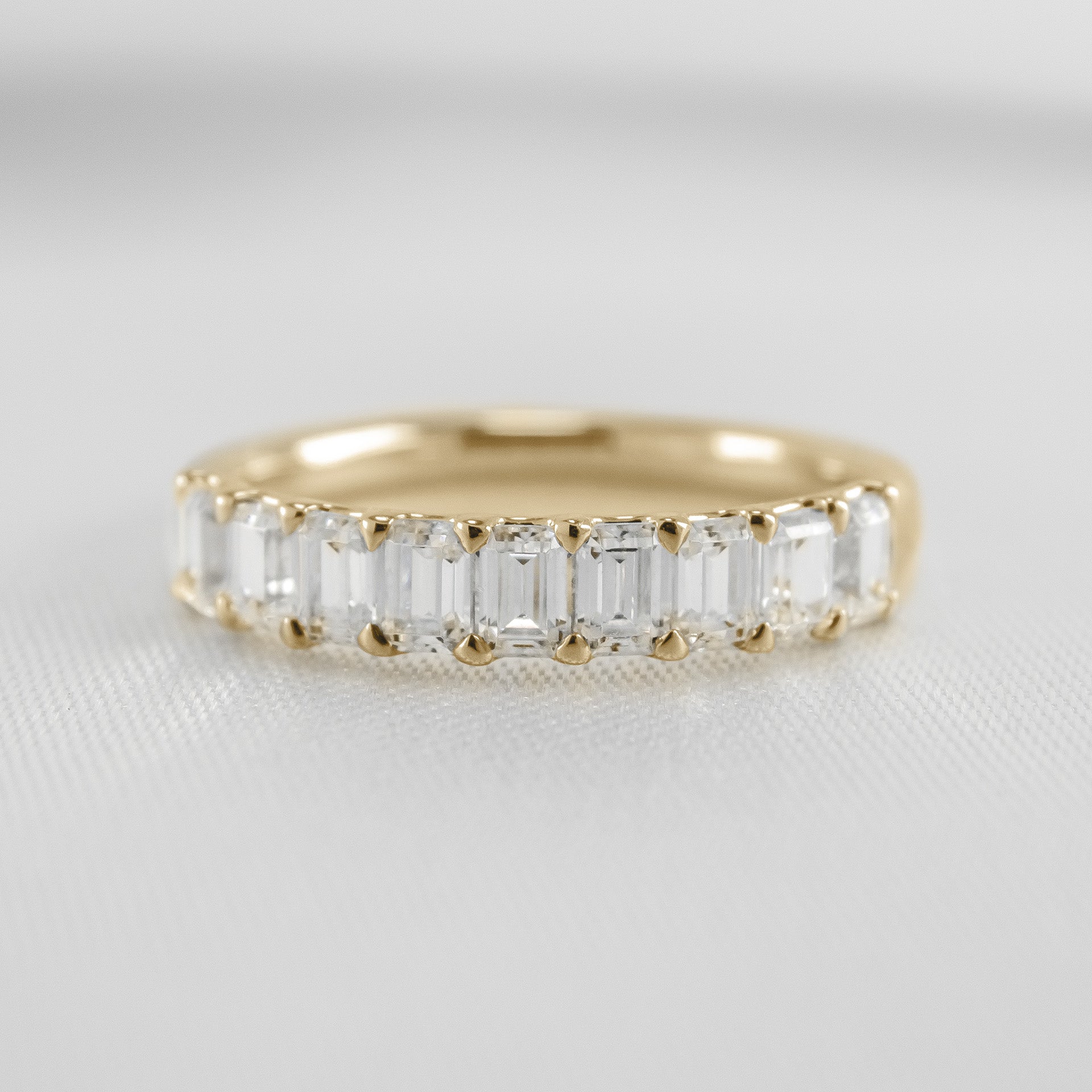 The Mercer Half Eternity Emerald Cut Diamond Wedding Ring