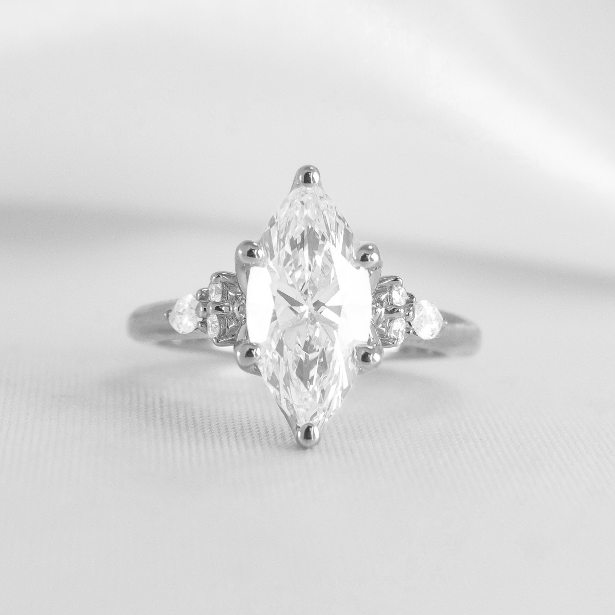Shown in 2 Carat Diamond*The Meredith cathedral Engagement Ring with marquise cut diamond in white gold from the front by Lisa Robin#color_14k-white-gold
