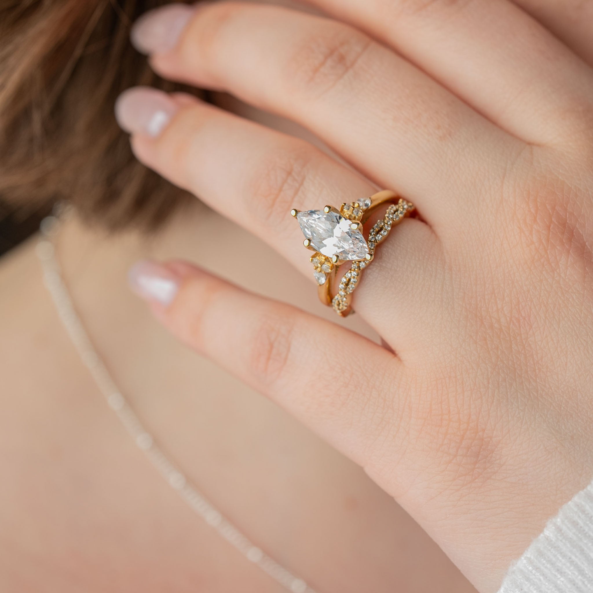Shown in 2 Carat Diamond*The Meredith cathedral Engagement Ring with marquise cut diamond in yellow gold on model hand by Lisa Robin#color_14k-yellow-gold
