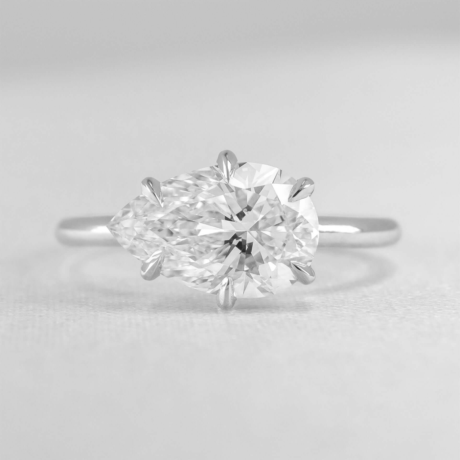 Shown in 2.57 Carat*The Mia claw prong East West pear cut Diamond Solitaire Engagement Ring in white gold by Lisa Robin#color_14k-white-gold#shape_pear
