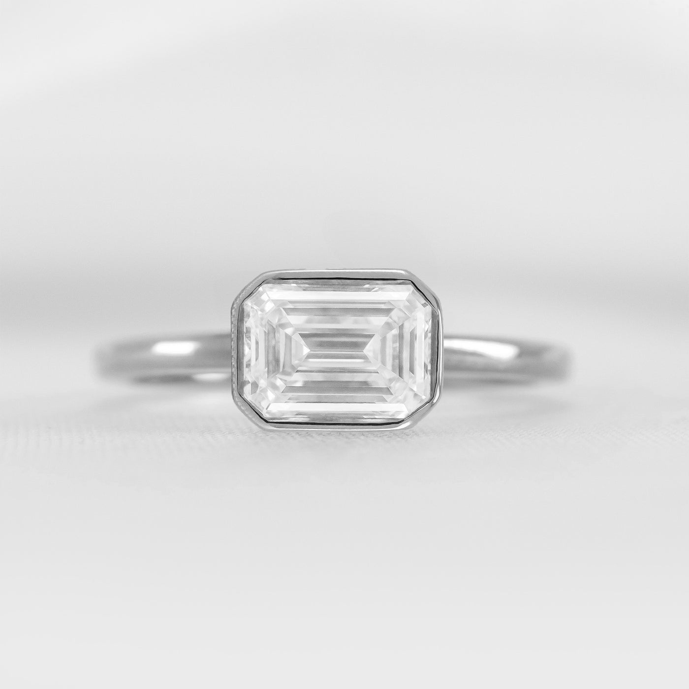 Shown in 1.75 Carat * The Nova Bezel East West Diamond Ring | Lisa Robin#shape_emerald