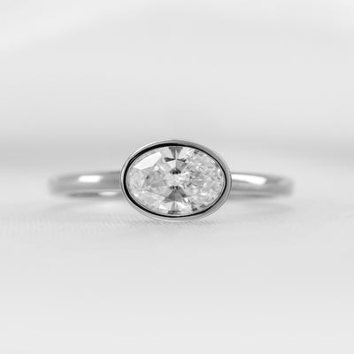 Shown in 1.5 Carat * The Nova Bezel East West Diamond Ring | Lisa Robin#shape_oval