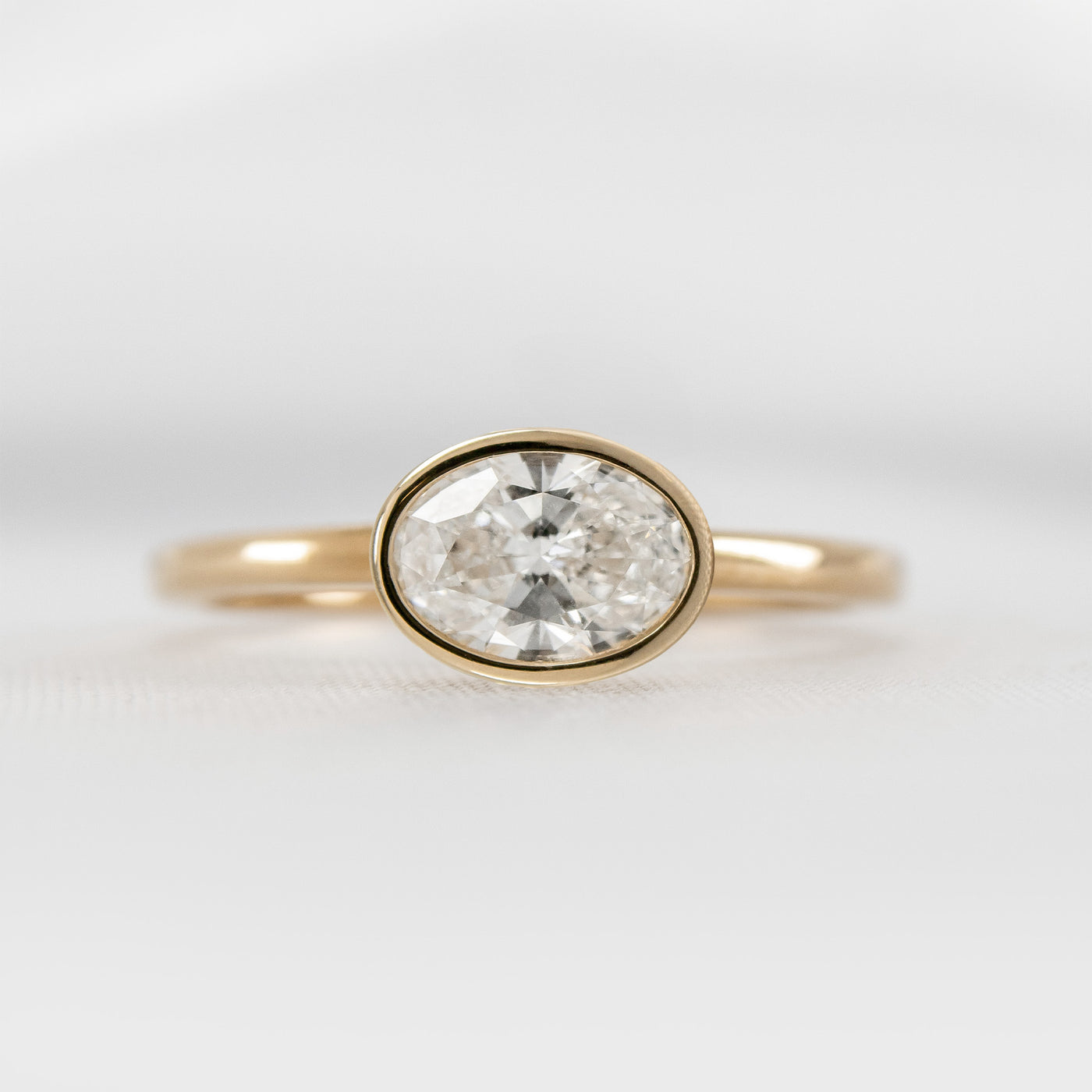 Shown in 1.5 Carat * The Nova Bezel East West Diamond Ring | Lisa Robin#shape_oval