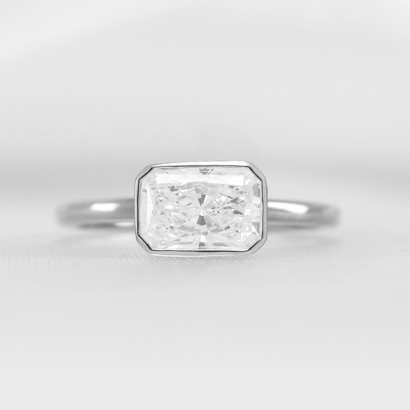 Shown in 1.75 Carat * The Nova Bezel East West Diamond Ring | Lisa Robin#shape_radiant