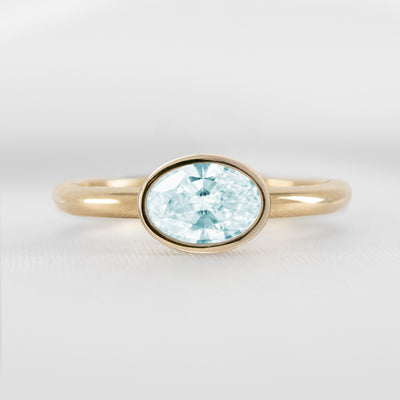 Shown in 1.30 carat Aquamarine* The Nova East West Bezel Aquamarine Engagement Ring | Lisa Robin#color_14k-yellow-gold