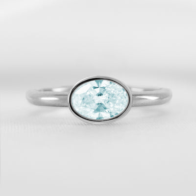 Shown in 1.30 carat Aquamarine* The Nova East West Bezel Aquamarine Engagement Ring | Lisa Robin#color_platinum