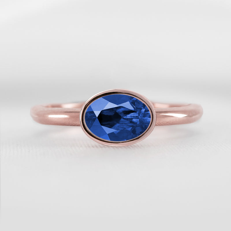Shown in 1.30 Carat Blue Sapphire * The Nova East West Sapphire Bezel Engagement Ring | Lisa Robin