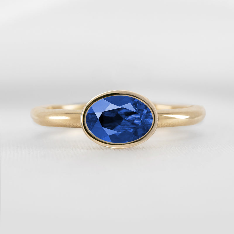 Shown in 1.30 Carat Blue Sapphire * The Nova East West Sapphire Bezel Engagement Ring | Lisa Robin