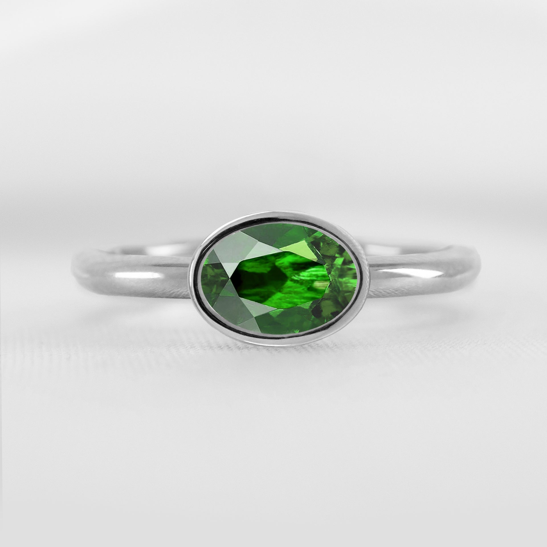 The Nova Green Diamond East-West Bezel Engagement Ring
