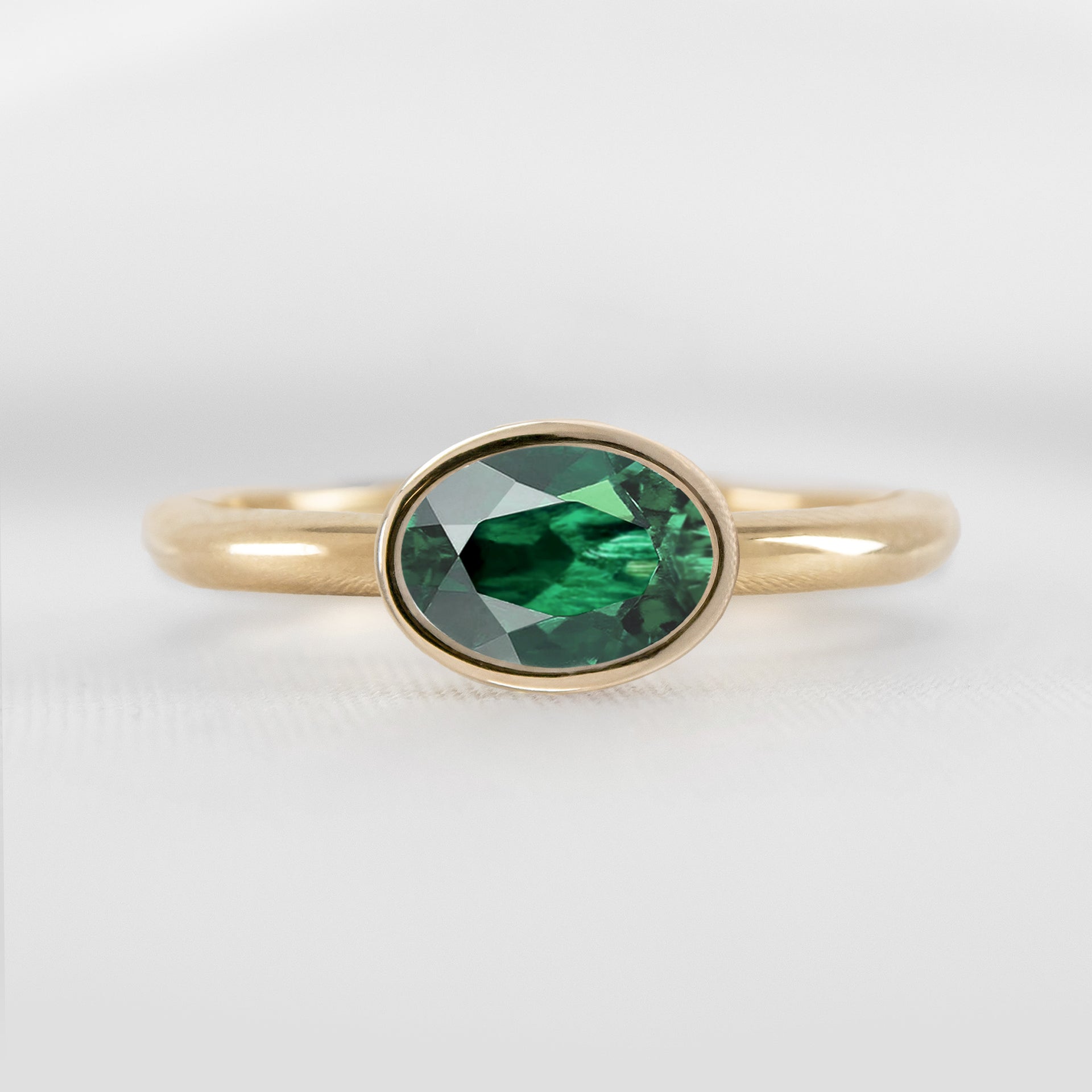 Shown in 1.30 carat Green Emerald* The Nova Green Emerald East-West Bezel Engagement Ring | Lisa Robin#color_14k-yellow-gold