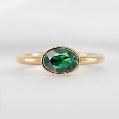 Shown in 1.30 carat Green Emerald* The Nova Green Emerald East-West Bezel Engagement Ring | Lisa Robin#color_14k-yellow-gold
