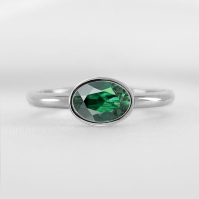 Shown in 1.30 carat Green Emerald* The Nova Green Emerald East-West Bezel Engagement Ring | Lisa Robin#color_platinum