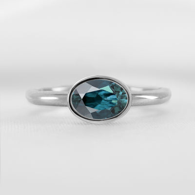 Shown in 1.30 Carat Teal Sapphire * The Nova East West Sapphire Bezel Engagement Ring#color_platinum