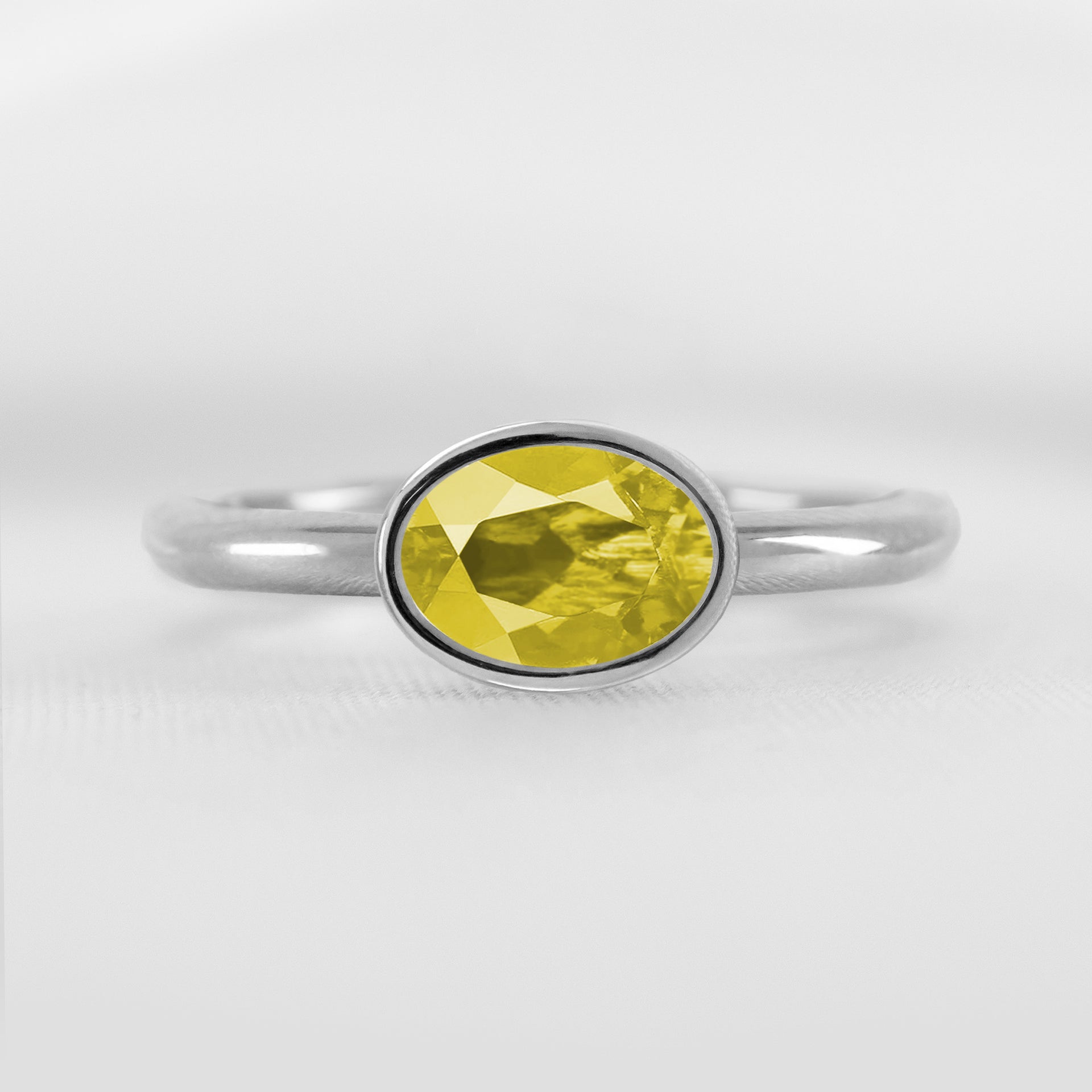 The Nova Yellow Diamond East-West Bezel Engagement Ring