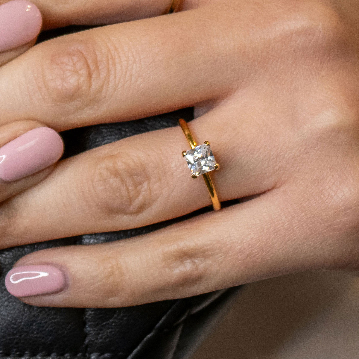 Shown in 1.5 Carat Diamond*The Olivia princess cut solitaire diamond in yellow gold on model hand by Lisa Robin#color_14k-yellow-gold#shape_all 