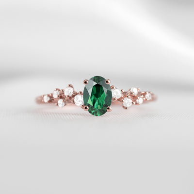 The Polaris oval green emerald and diamonds engagement ring in rose gold | Lisa Robin