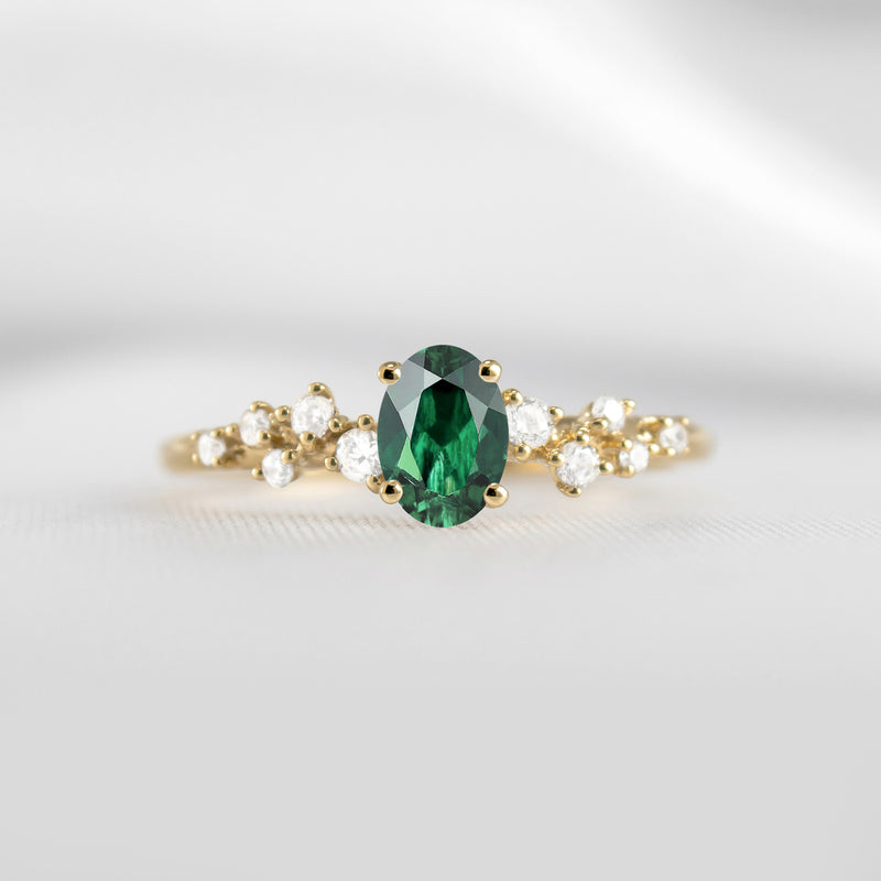 The Polaris oval green emerald and diamonds engagement ring in yellow gold | Lisa Robin