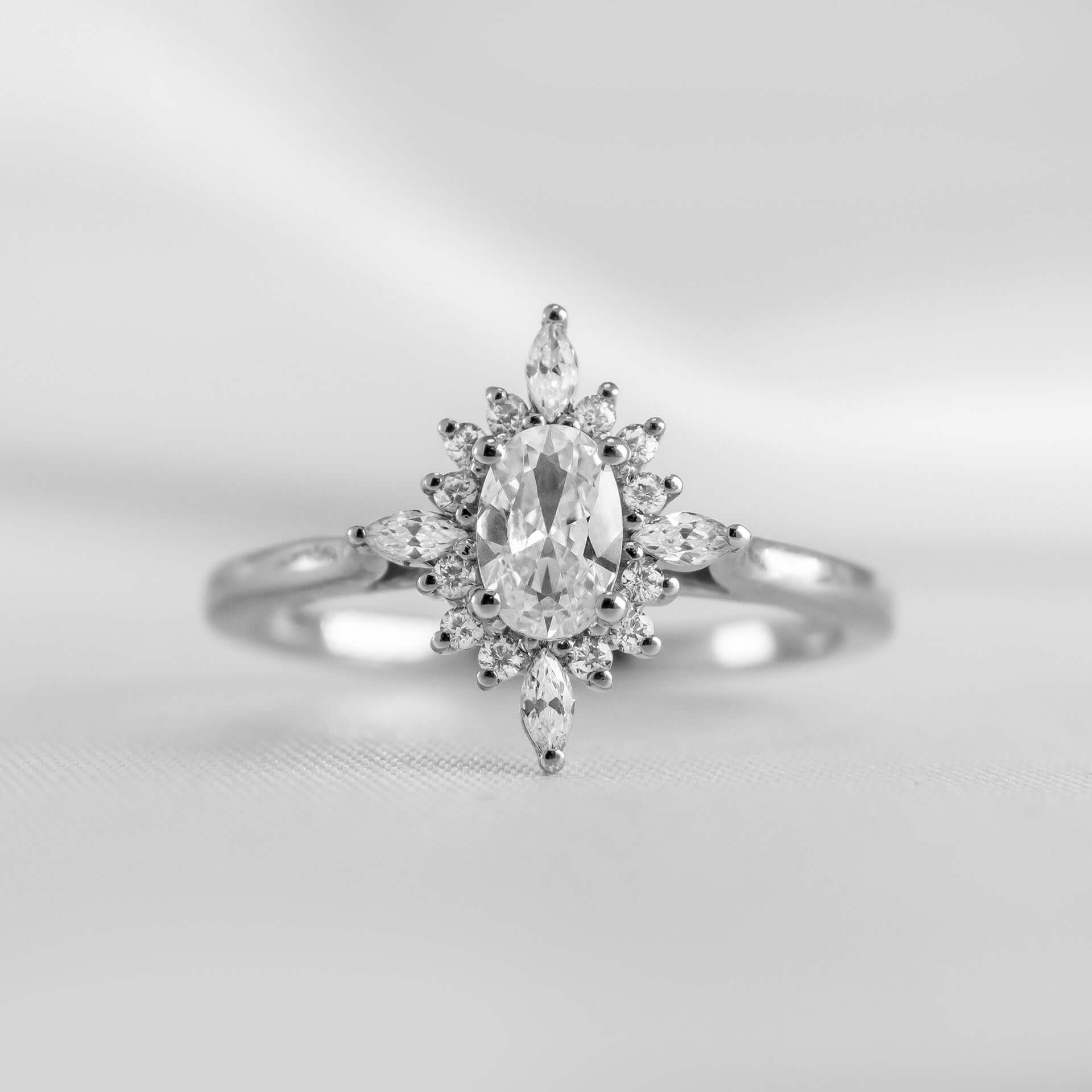 Shown in 1.5 Carat Diamond*The Revel Halo Engagement Ring with oval cut diamond in platinum from front by Lisa Robin#color_platinum