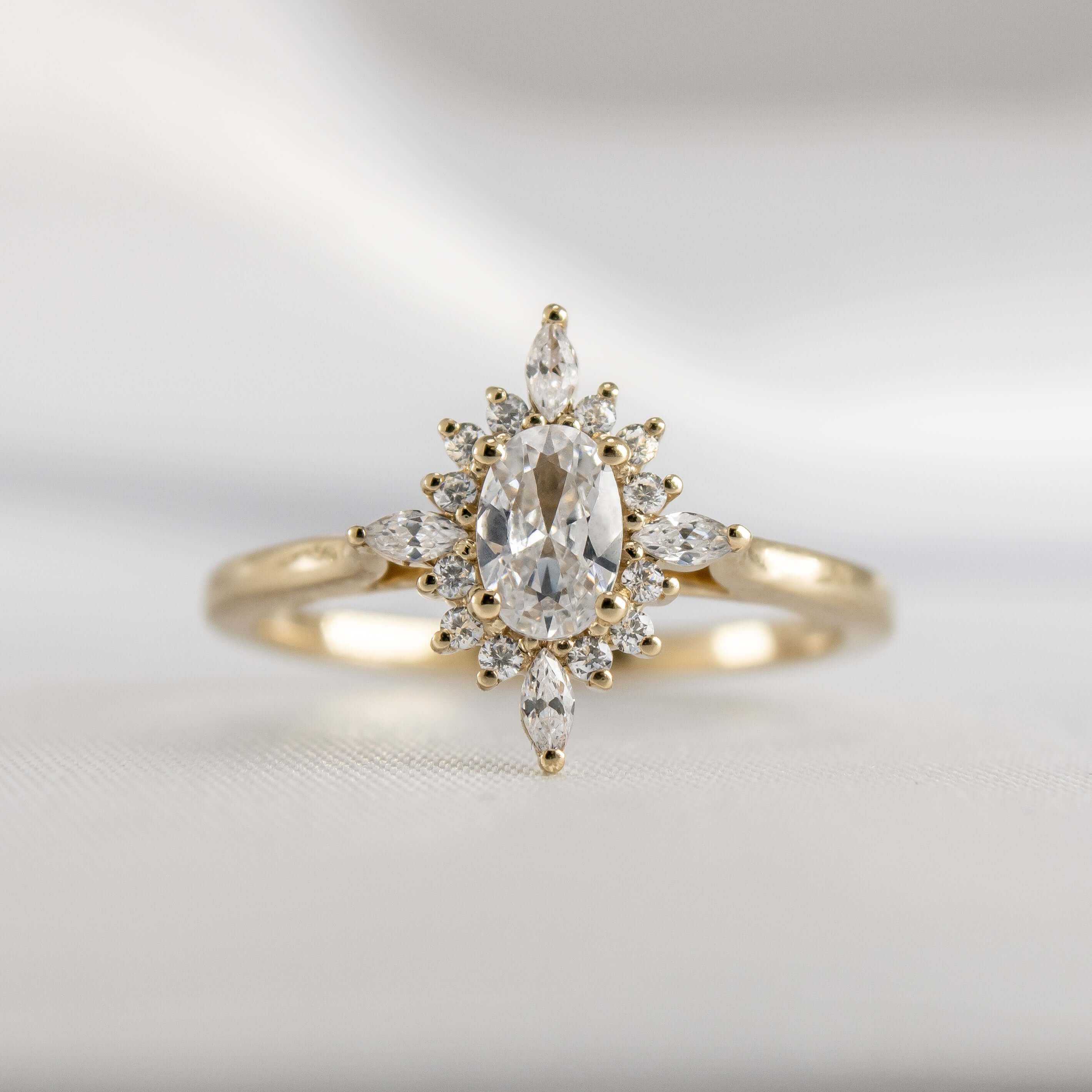 Shown in 1.5 Carat Diamond*The Revel Halo Engagement Ring with oval cut diamond in yellow gold from front by Lisa Robin#color_14k-yellow-gold