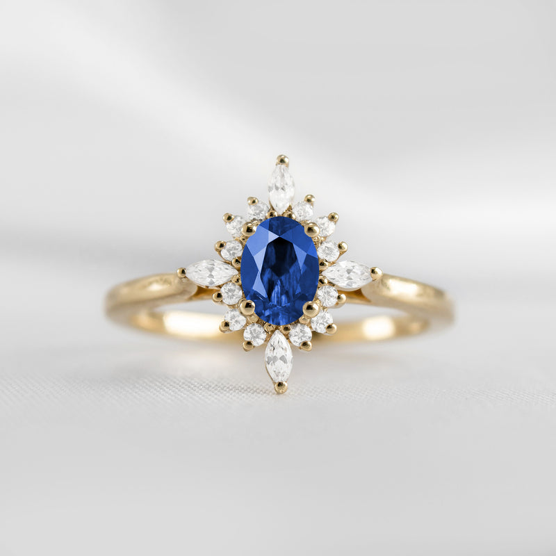 Shown in 1.0 carat Blue Sapphire* The Revel Blue Sapphire and Diamond Halo Engagement Ring | Lisa Robin