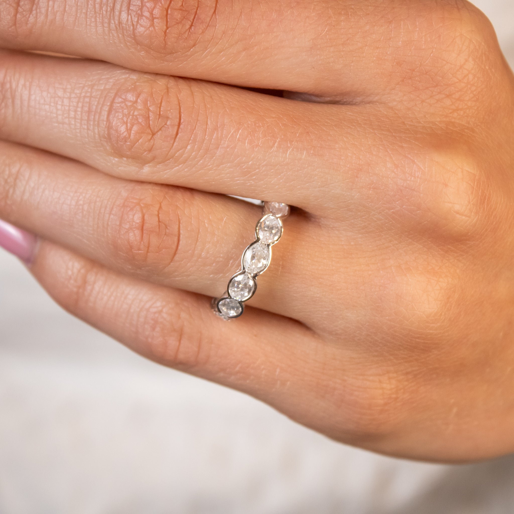 Samara Half Bezel Oval Diamond Eternity Wedding Ring in 14K white gold from front by Lisa Robin#color_14k-white-gold