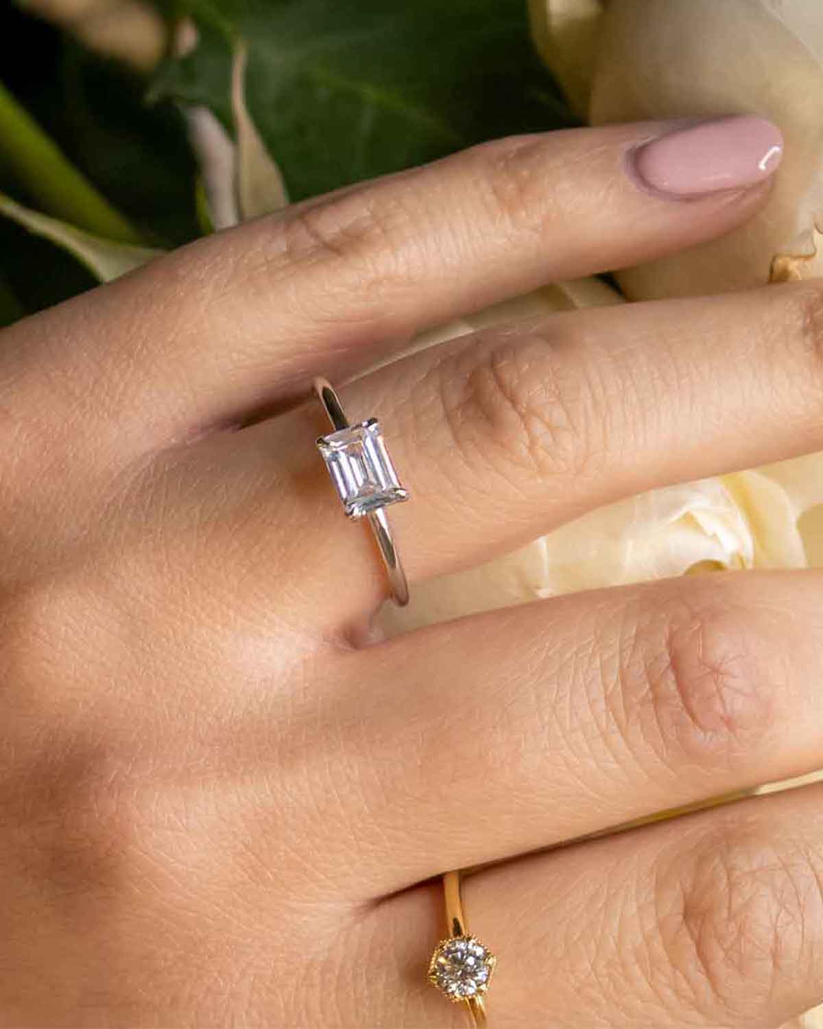 Mia east west solitaire with emerald cut diamond in white gold by Lisa Robin