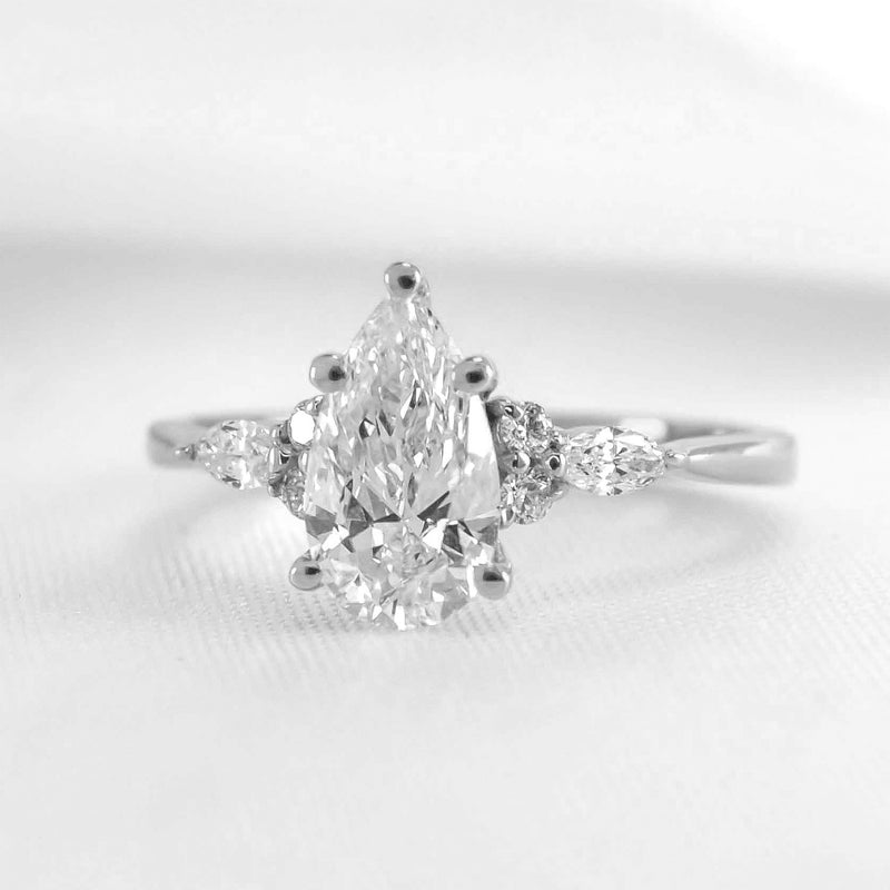 Shown in 1.0 Carat * The Sophia Pear Moissanite Diamond Side Stone Engagement Ring | Lisa Robin