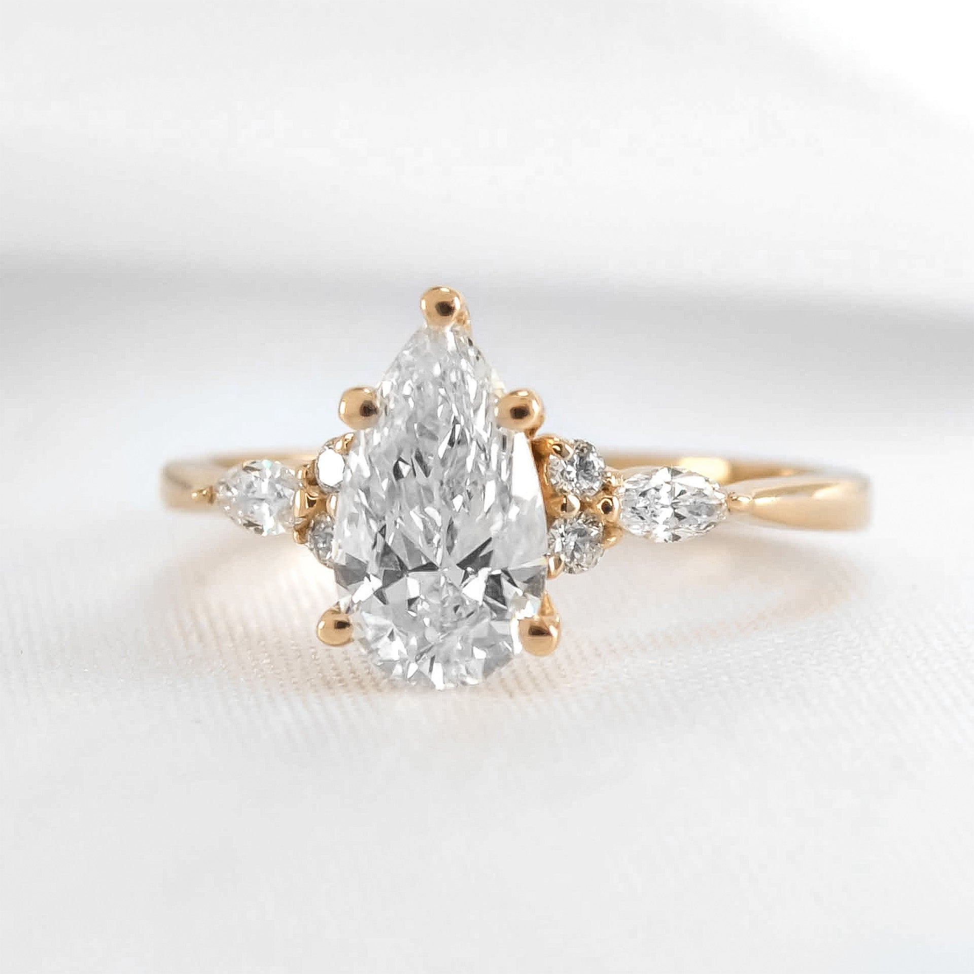 Shown in 1.0 Carat * The Sophia Pear Moissanite Diamond Side Stone Engagement Ring | Lisa Robin