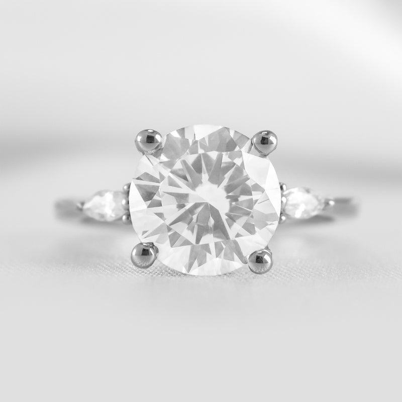 The Sophia Moissanite Diamond Side Stone Engagement Ring