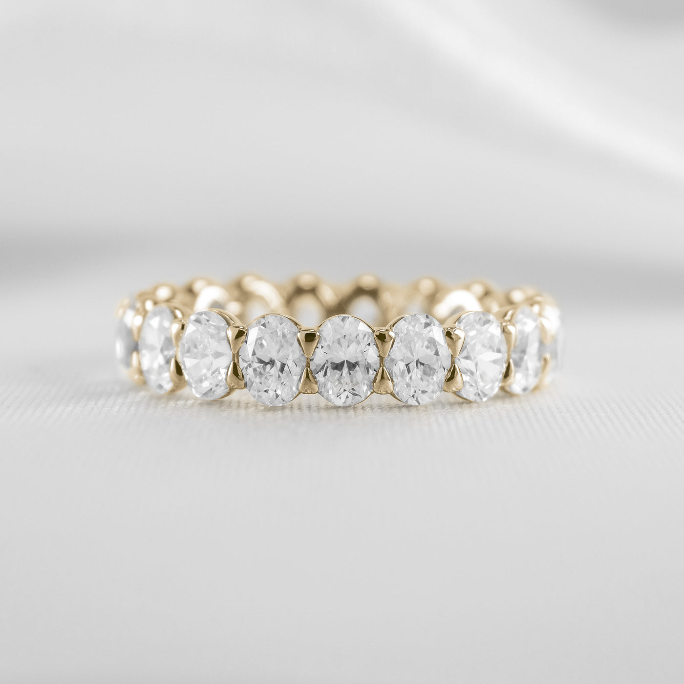 Shown in 4 Carat * The Sutton Oval Diamond Eternity Ring | Lisa Robin#color_14k-yellow-gold