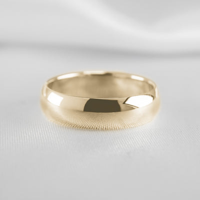 The Tanner gold wedding ring in 8mm#color_14k-yellow-gold