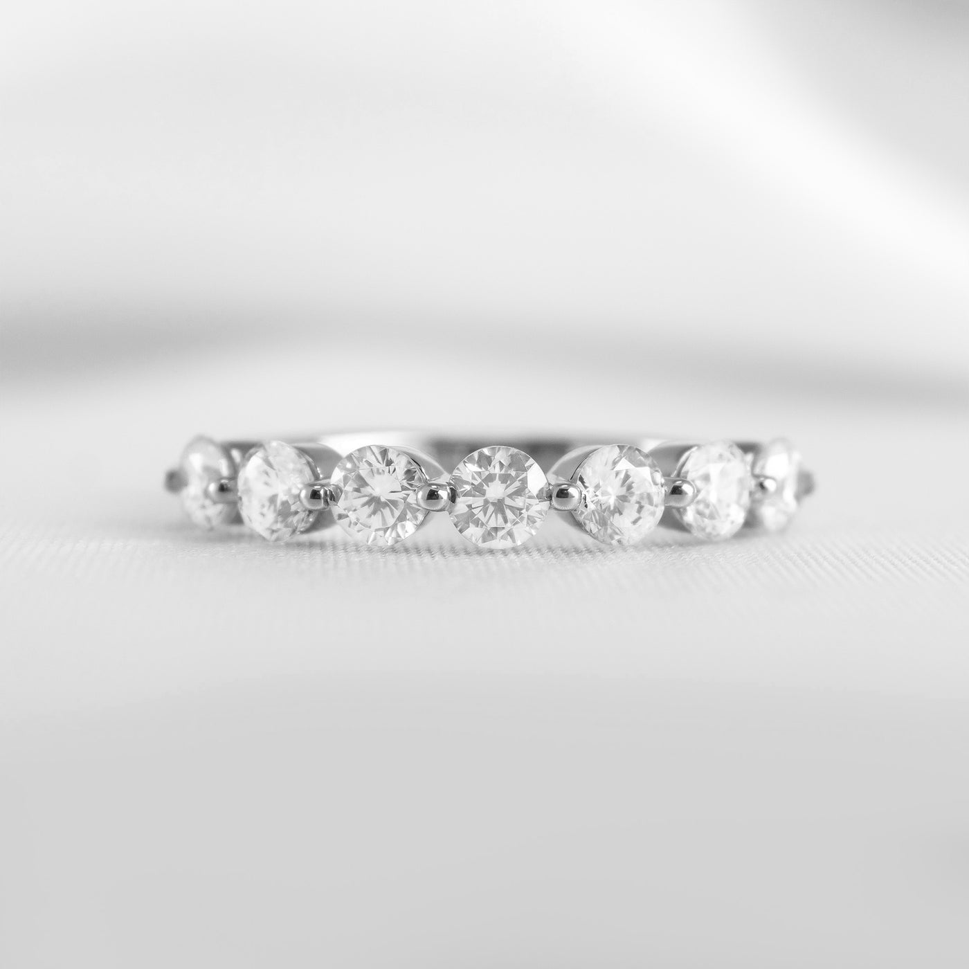 The Taryn Floating 7 Stone Diamond Wedding Ring | Lisa Robin#color_18k-white-gold