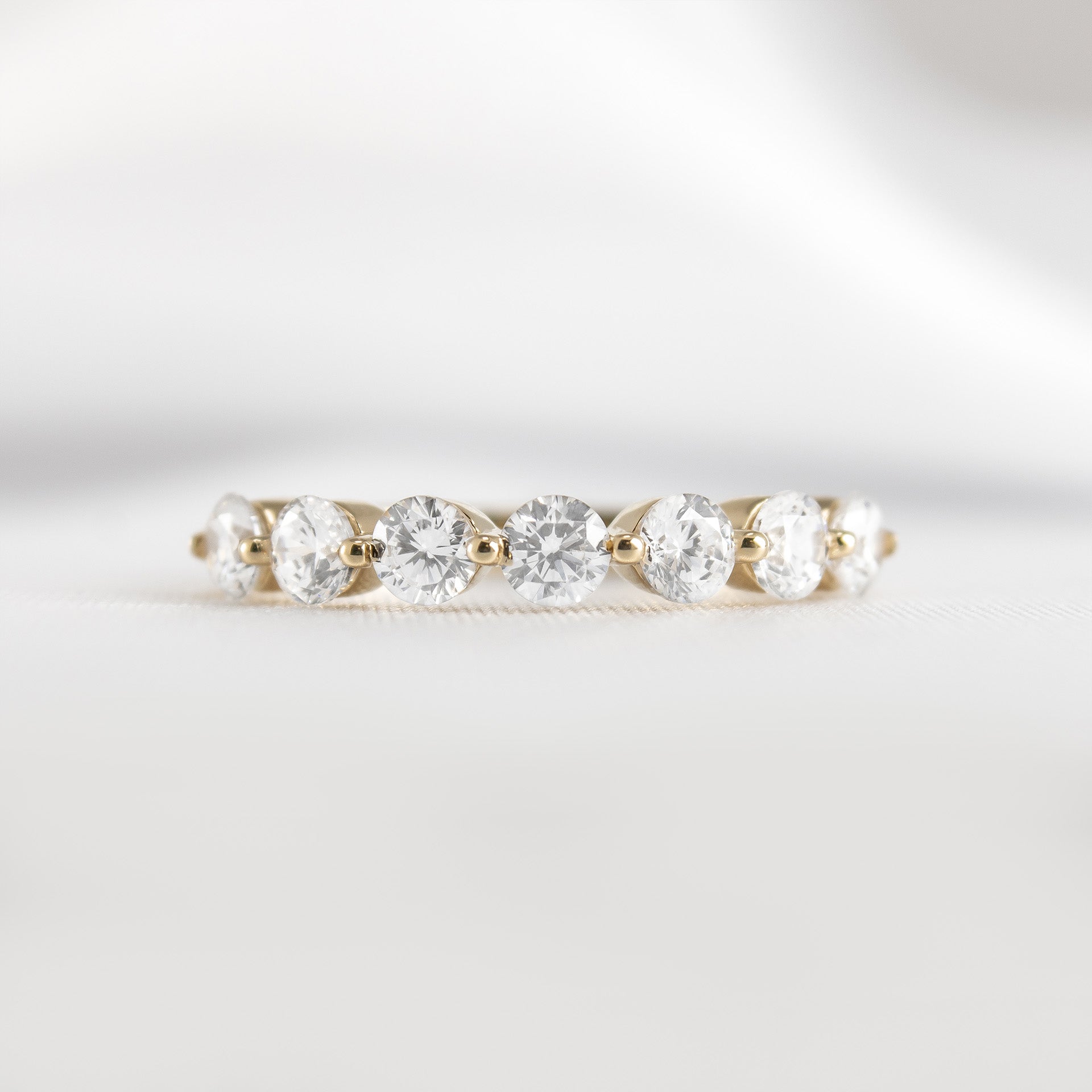 The Taryn Floating 7 Stone Diamond Wedding Ring | Lisa Robin#color_14k-yellow-gold