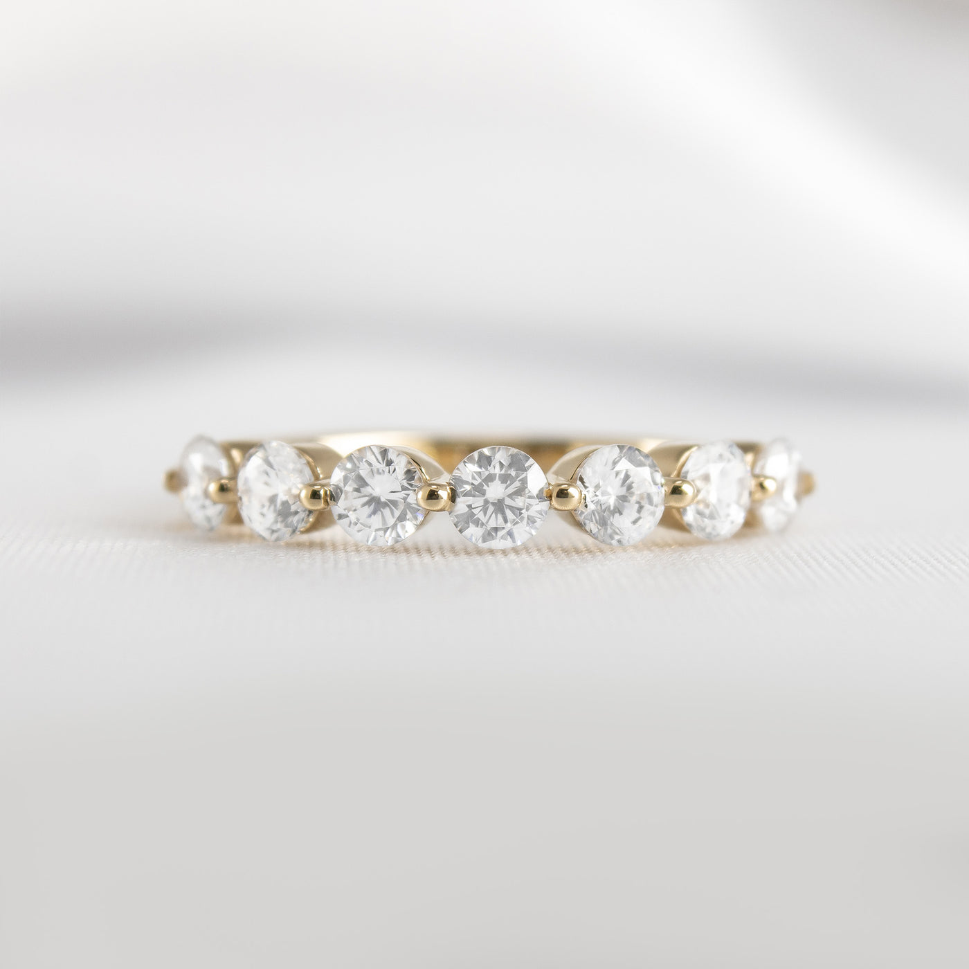 The Taryn Floating 7 Stone Diamond Wedding Ring | Lisa Robin#color_18k-yellow-gold