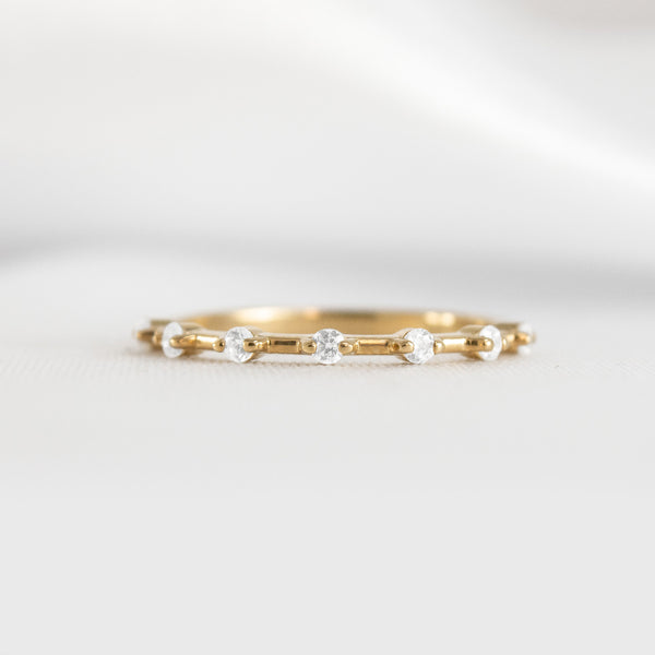 Verity distance diamond wedding ring in yellow gold by lisa Robin Jewelry