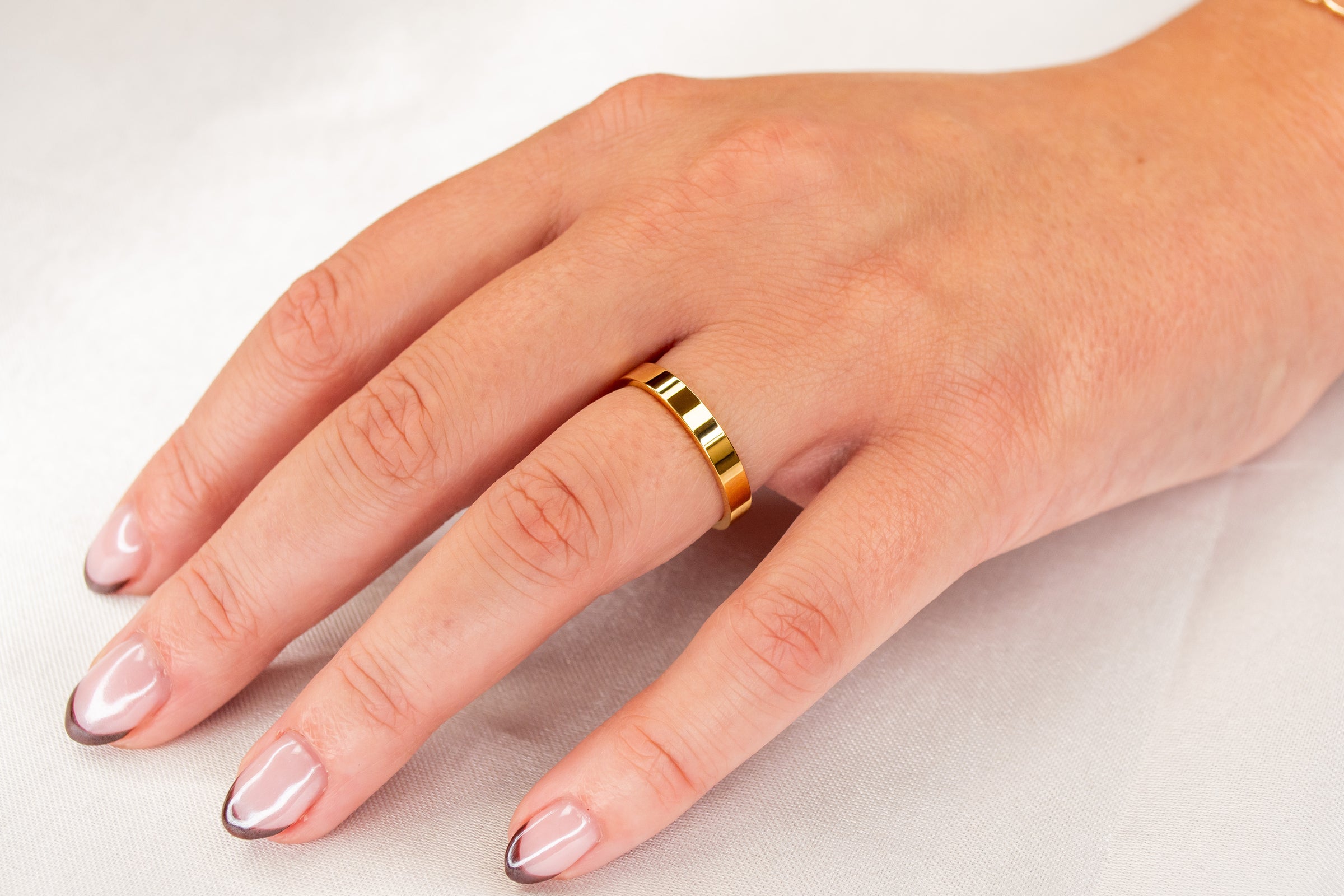 Yellow gold flat band on model | Lisa Robin