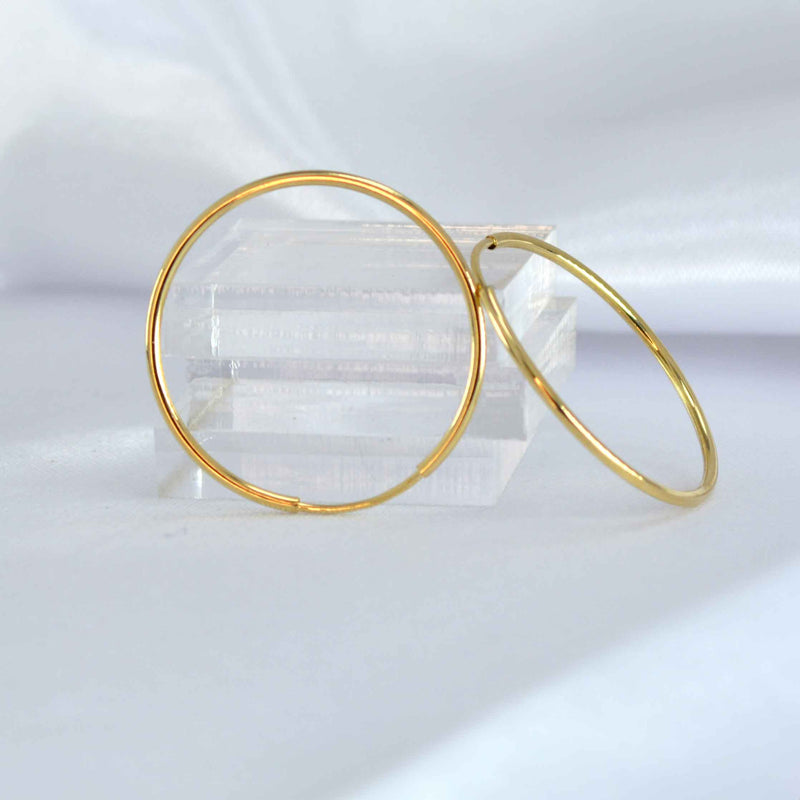 Shown in 25mm * Endless 14K Gold Hoops