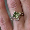 The Galaeth Cluster Green Diamond Engagement Ring with cushion cut diamond in yellow gold on model hand by Lisa Robin jewelry