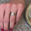 The Rene Diamond wedding Ring with in 14k yellow gold on model hand by Lisa Robin jewelry