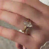 The Delilla Engagement Ring with marquise cut diamond in yellow gold on model hand by Lisa Robin Jewelry
