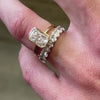 The Noah 9 stone oval Diamond wedding Ring with in 14k yellow gold on model hand by Lisa Robin jewelry