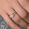 The Remy diamond twist engagement ring paired with the Maria diamond wedding band on model | Lisa Robin