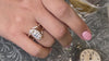 The Hadley diamond engagement ring paired with two Claire diamond wedding bands on model | Lisa Robin